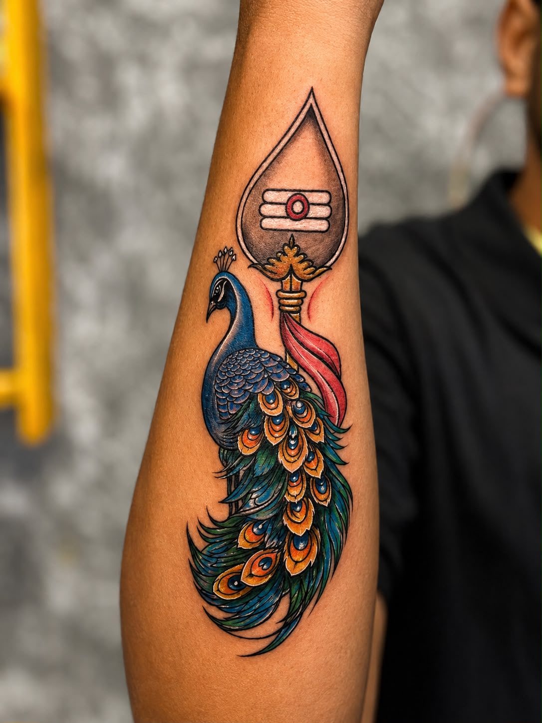 Peacock & Trishul